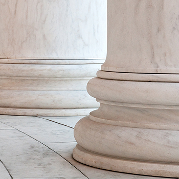 Close-up of a row of elegant white marble columns